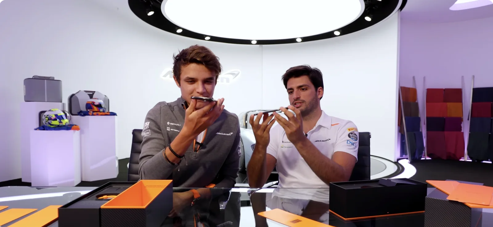 Lando Norris and Carlos Sainz unboxing the OnePlus 7T Pro McLaren Edition